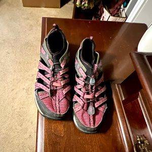 Chaco toe covered sandals. Berry color. Minimal wear.